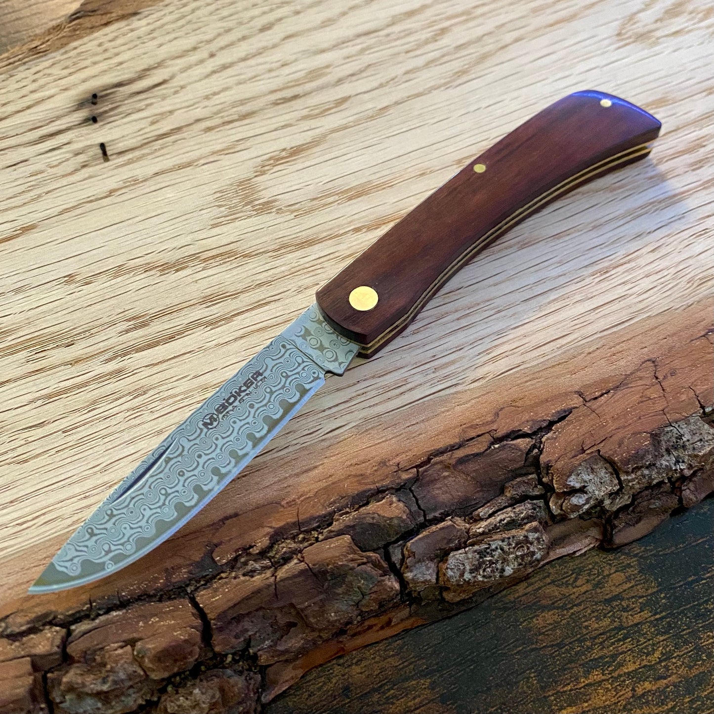 Taschenmesser Rangebuster Snake Damast, Damaststahl mit Schlangenholzgriff.