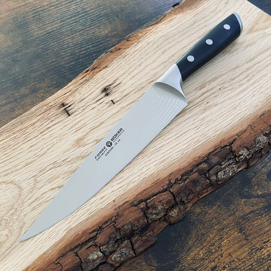 Schinkenmesser aus der Kochmesser-Serie Forge Böker Solingen.
Großes Kochmesser. Materialien Edelstahl und Spezialkunststoff.