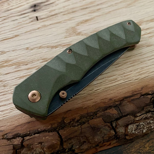 Taschenmesser Iguanodon mit Griffschalen aus grünem G10.