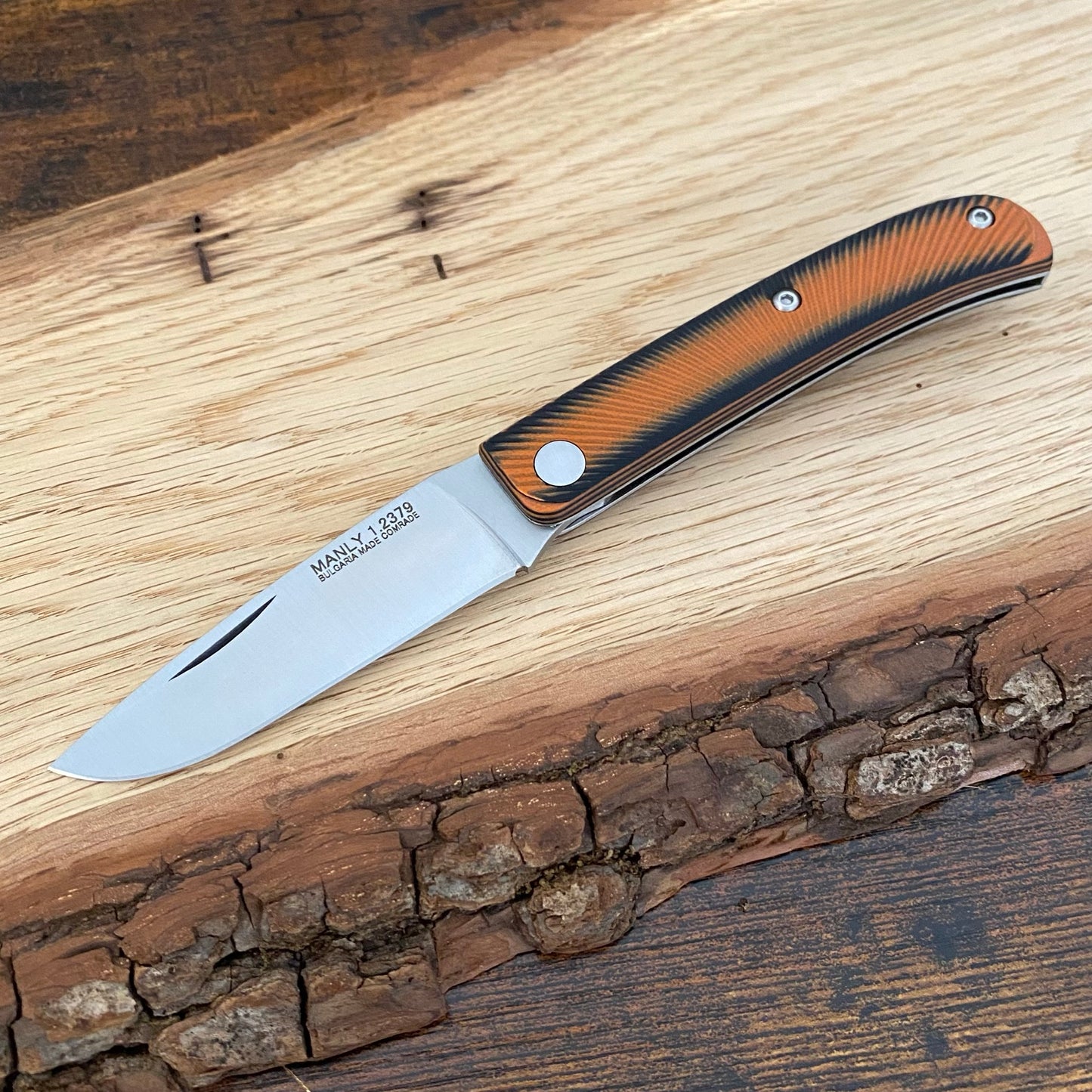 Taschenmesser
Manly Comrade D2 Black / Orange