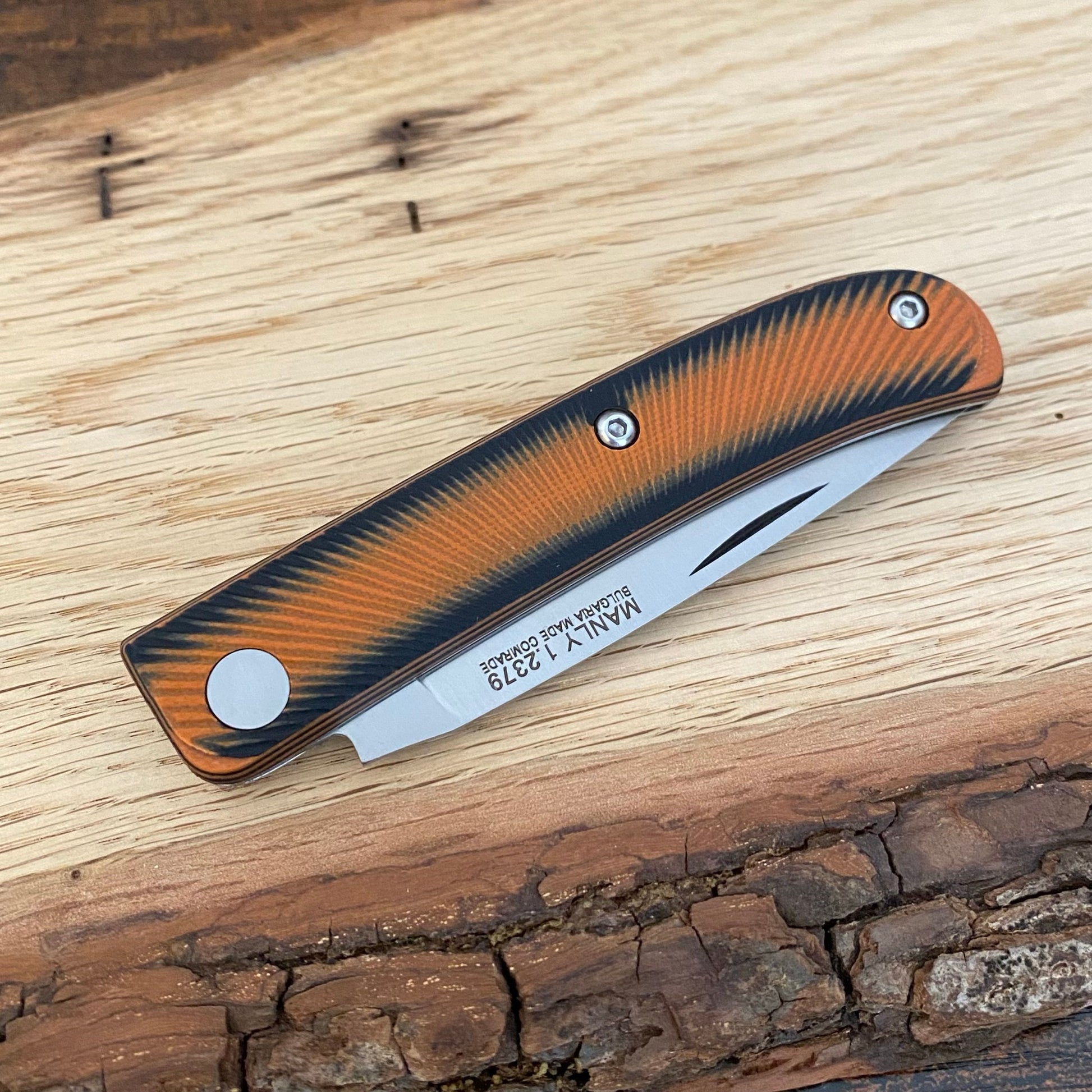 Taschenmesser
Manly Comrade D2 Black / Orange