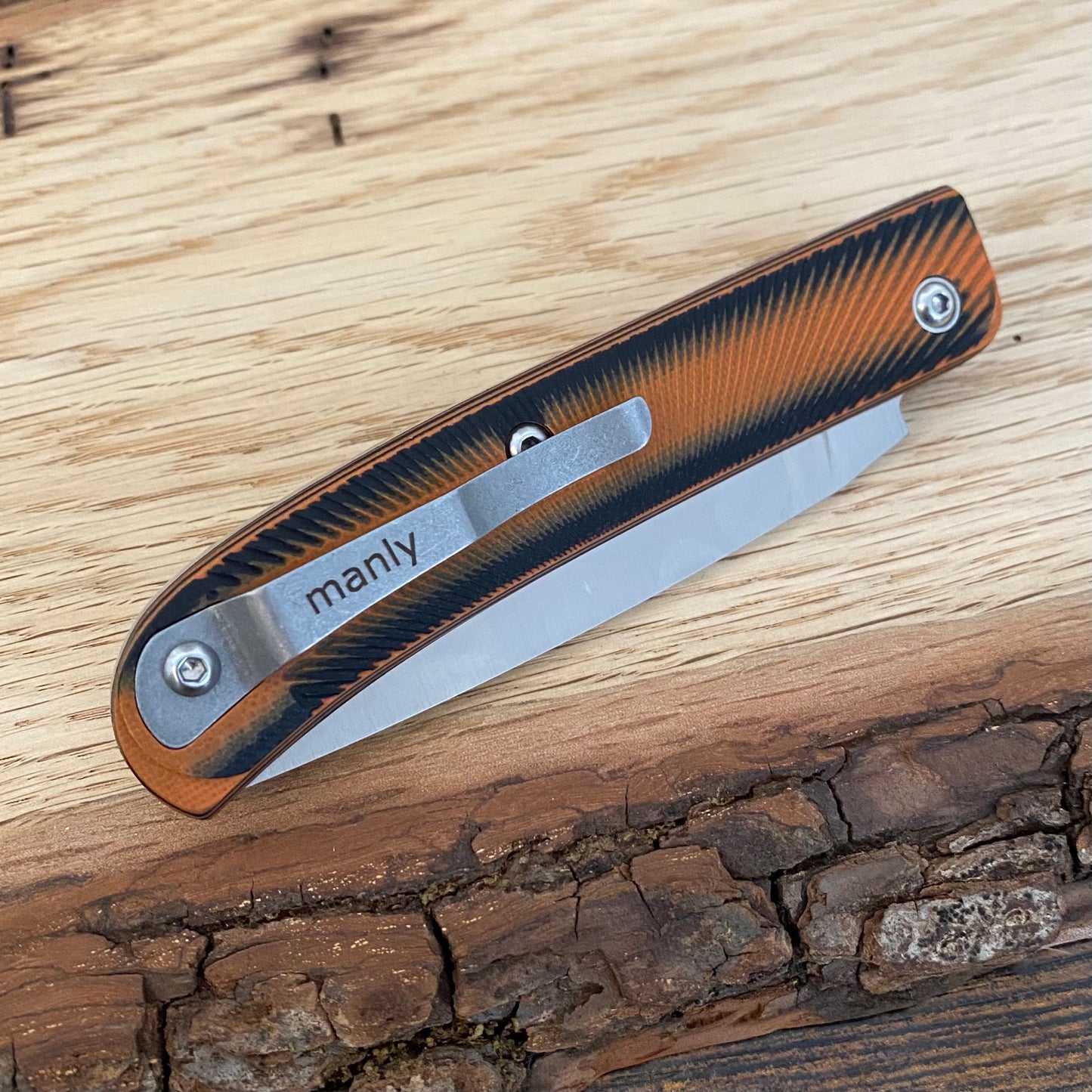 Taschenmesser
Manly Comrade D2 Black / Orange